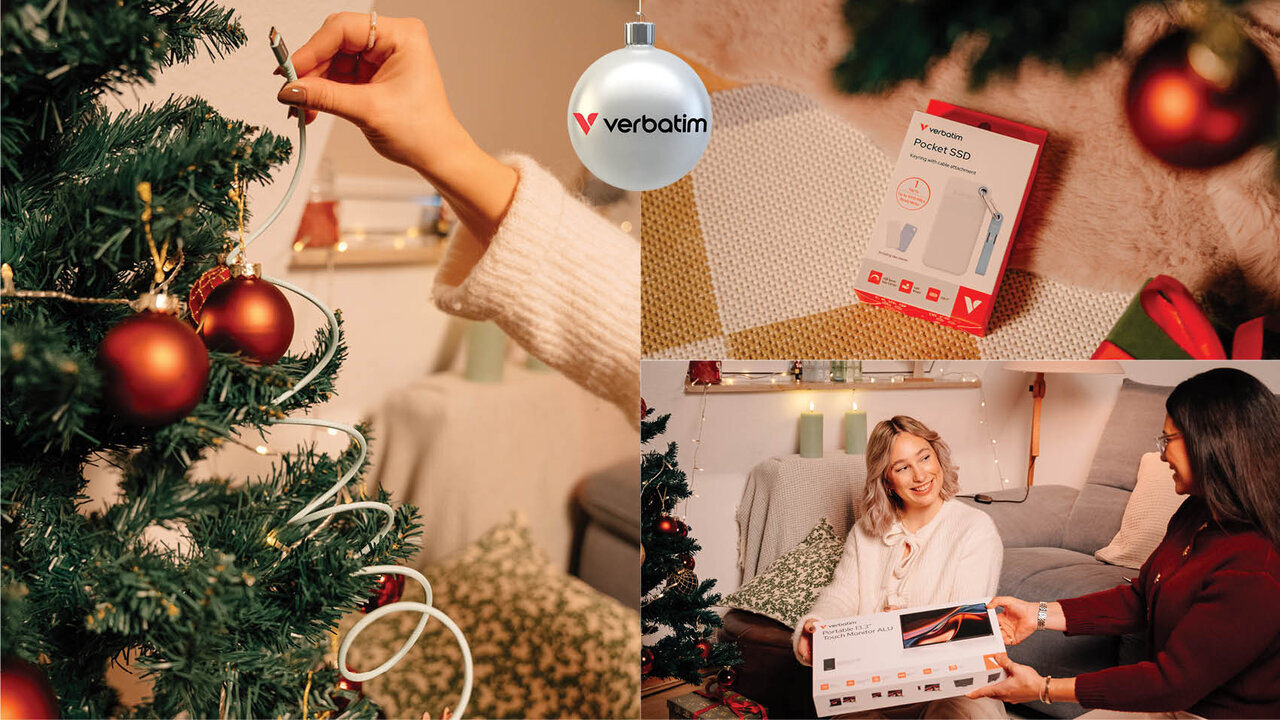 Christmas tree with cable, exchanging a portable monitor in front of the Christmas tree, gift under the christmas tree